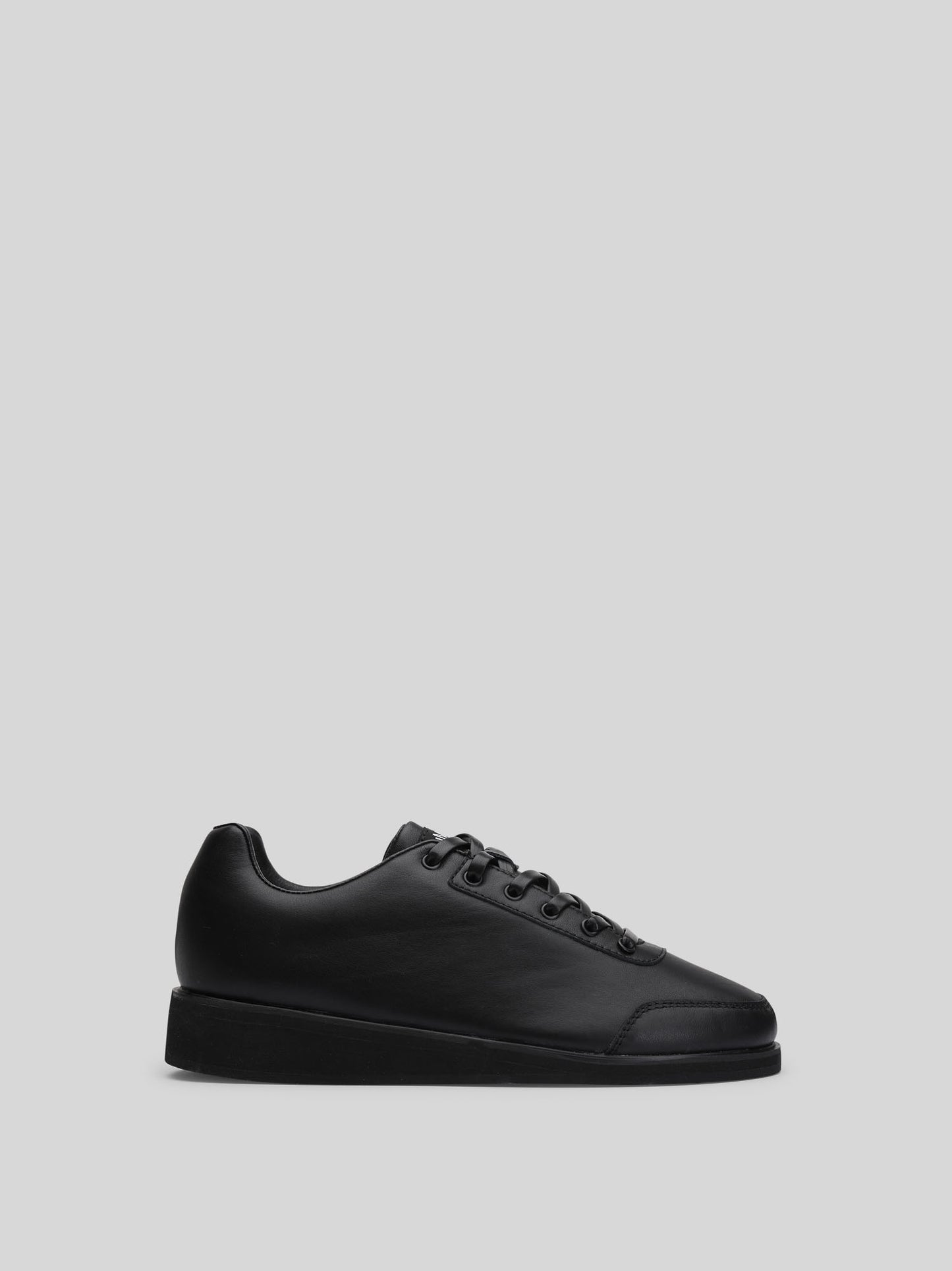 luxury black leather sneakers; full‑grain leather sneaker; handcrafted sneakers; JuMclu Portal; limited edition leather shoes; four‑layer outsole; premium leather sneakers Exclusive right sneaker shoe trainers JuMclu Portal Prototype black leather luxury fashion sneaker, left‑foot promotional edition, crafted in premium full‑grain leather with rare deadstock detailing, exclusive dressy silhouette, discount‑release trainers engineered for elevated style and high‑end streetwear appeal.